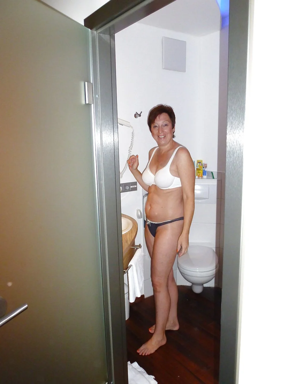 Retired school nurse still has an amazing body. Nerdy GILF has great tits and a stacked ass. 🔥🔥🤤 image 2
