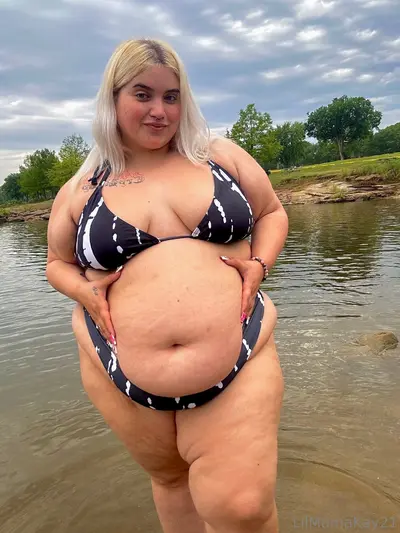 Plump ssbbw teases her round belly cover image