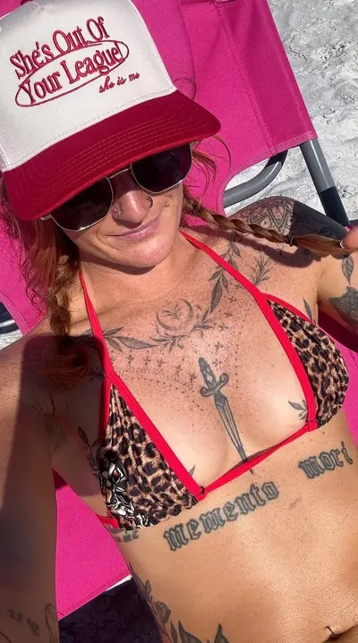 Tattoed redhead cover image