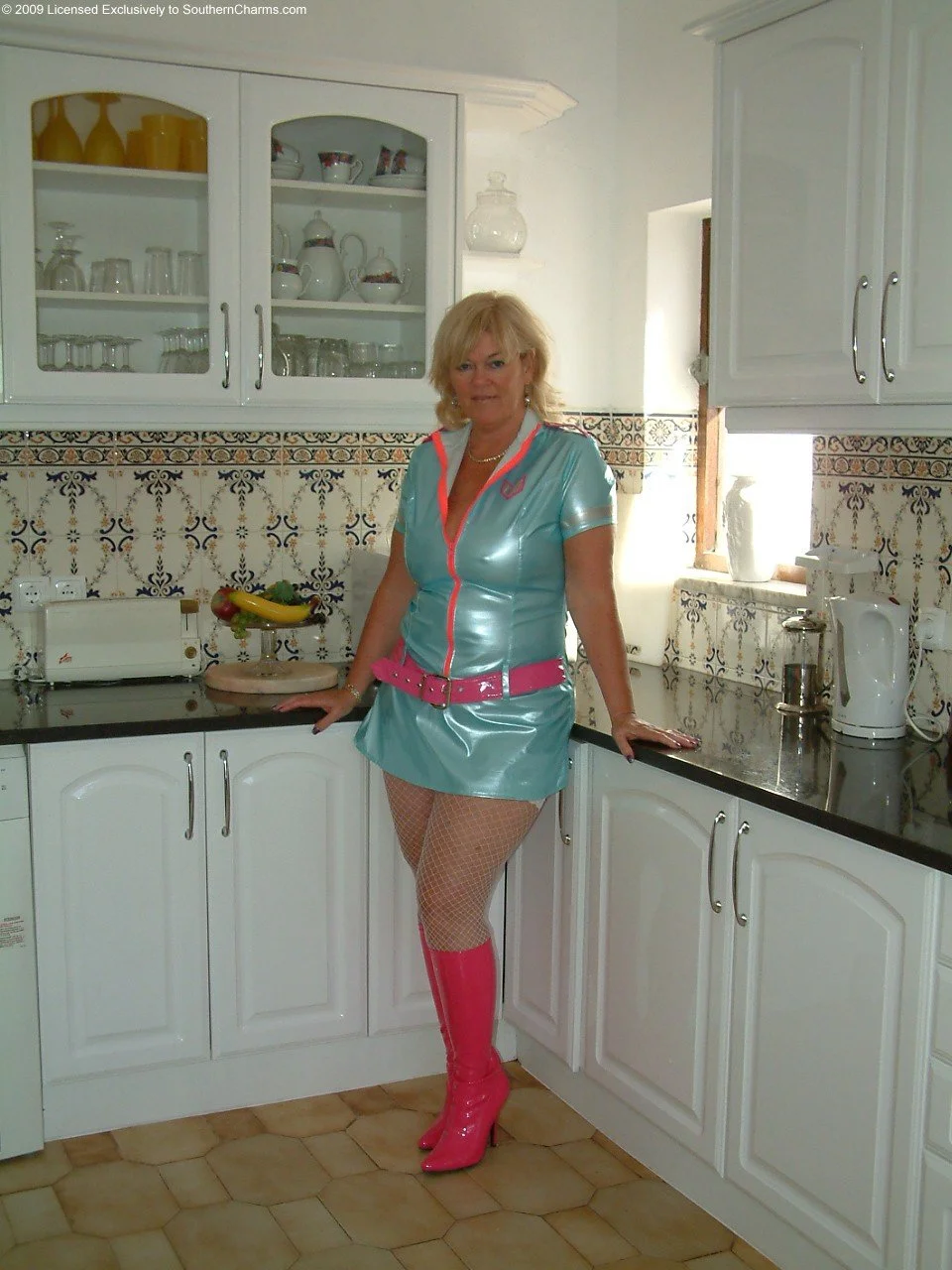 Old sexy PVC babe image 3
