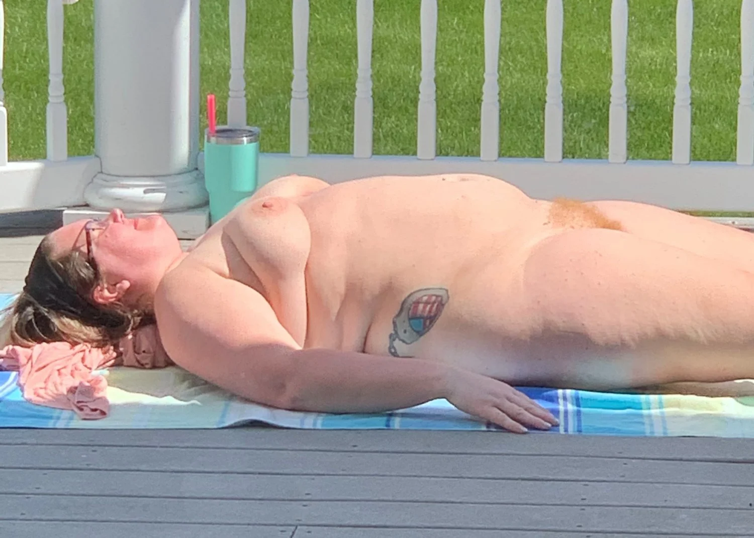 Mom sunbathing when dad is gone image 11
