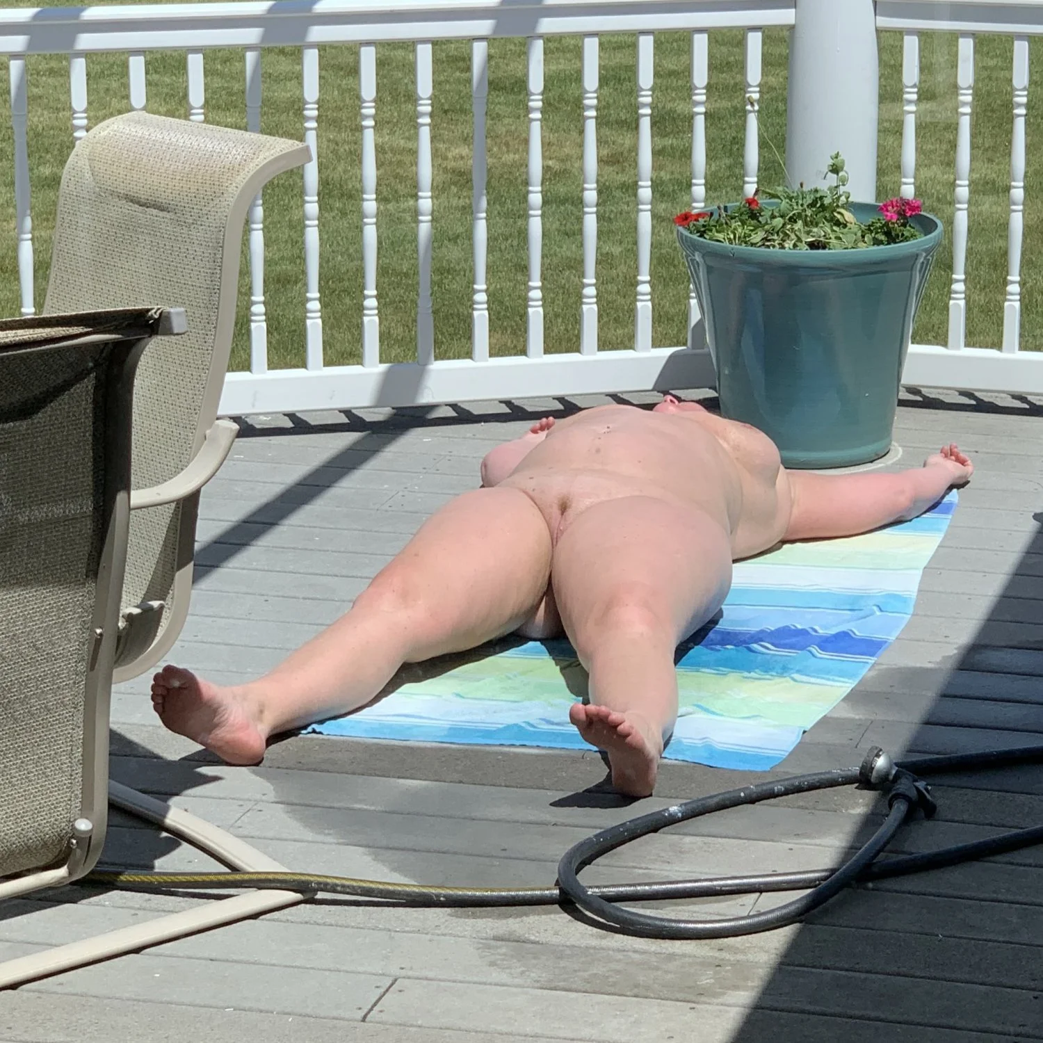 Mom sunbathing when dad is gone image 13