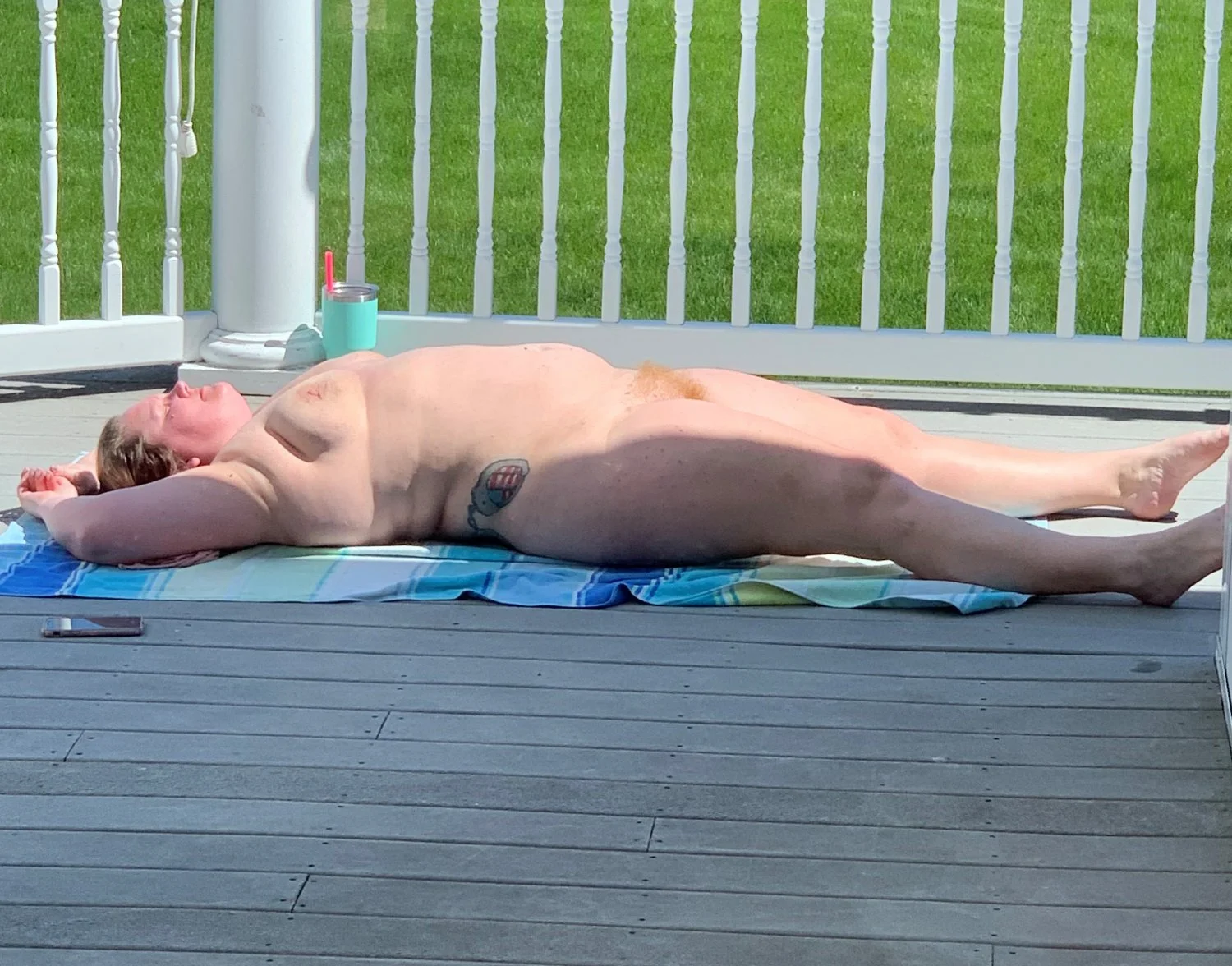 Mom sunbathing when dad is gone image 16