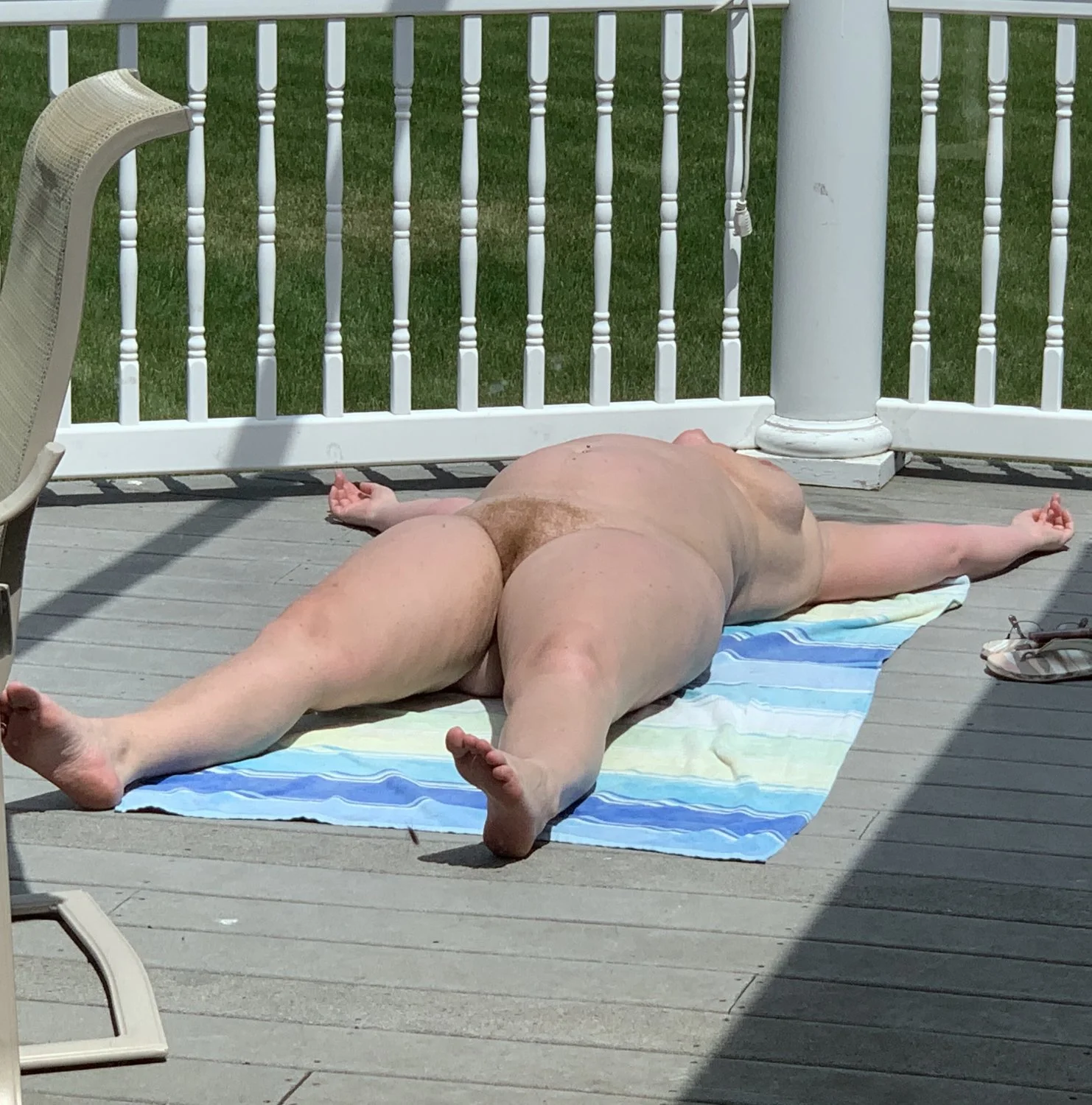 Mom sunbathing when dad is gone image 6
