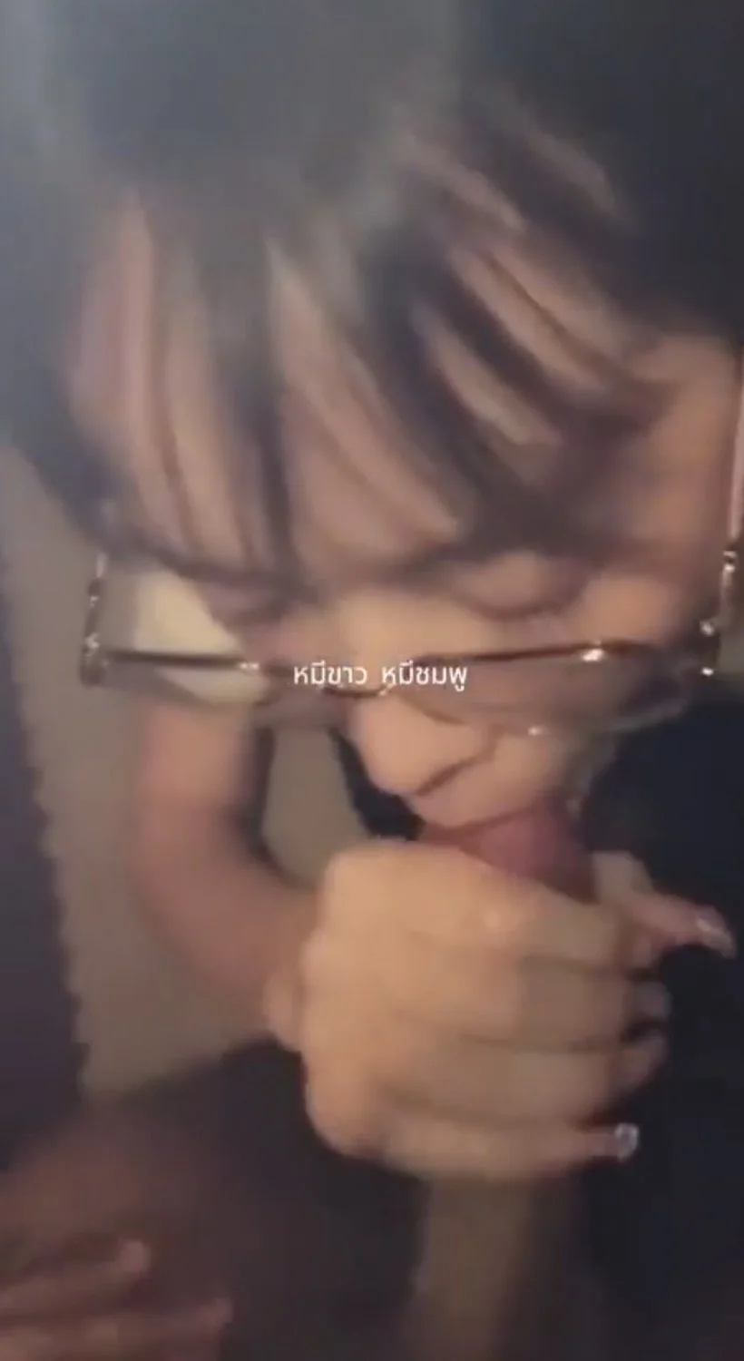 Tiny Asian teen with glasses sucking on some dark meat. Abg blowjob image 3
