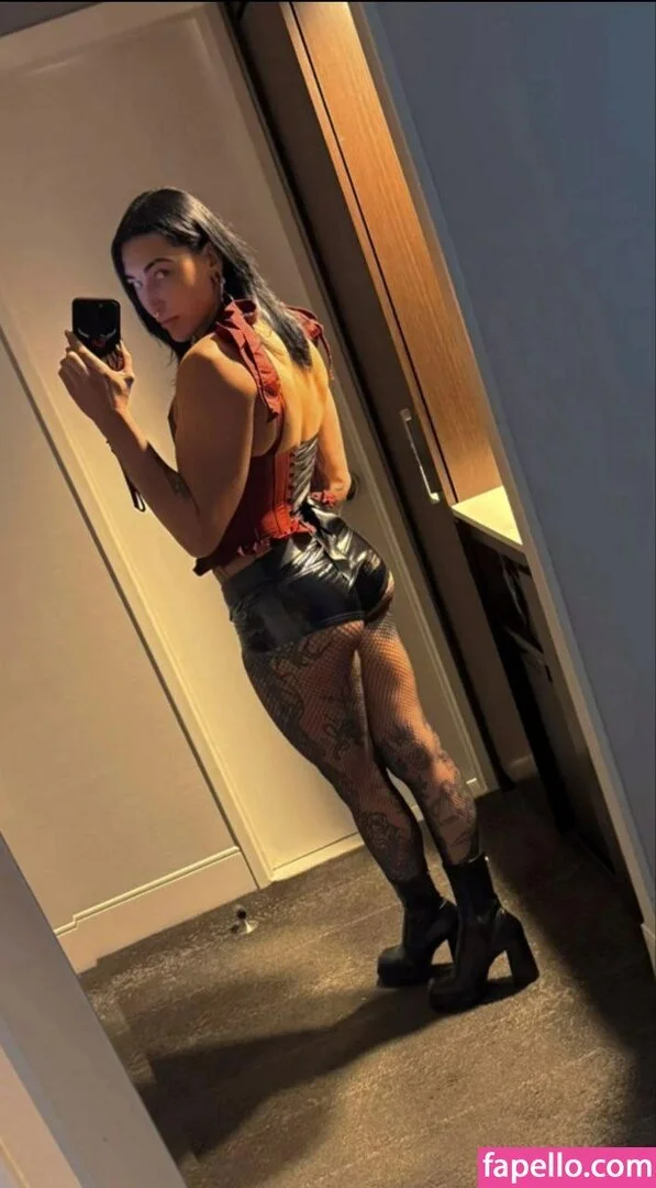 Am I the only one that wants to totally raw dog Rhea Ripley?! 😇🙏 image 14