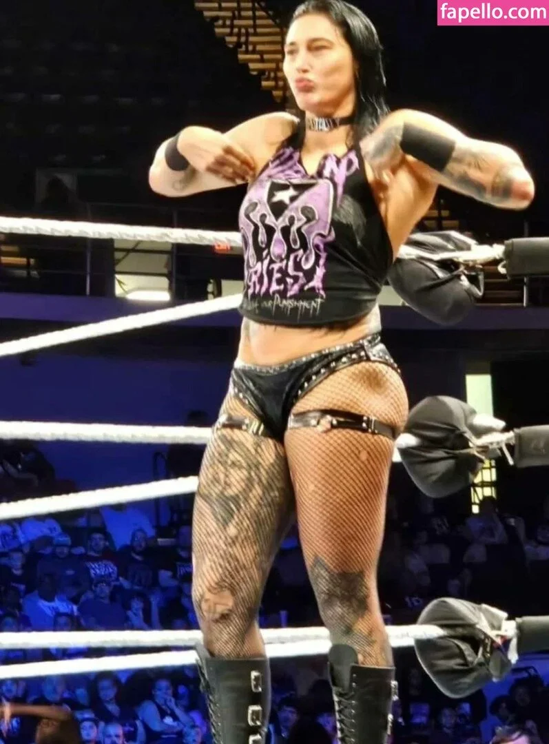 Am I the only one that wants to totally raw dog Rhea Ripley?! 😇🙏 image 31