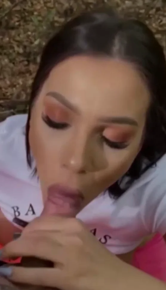 Beautiful slut with big tits sucks cock in the forest main image