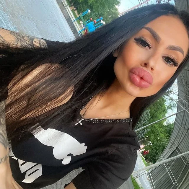 Bloated Bimbo Cock Kissers image 7