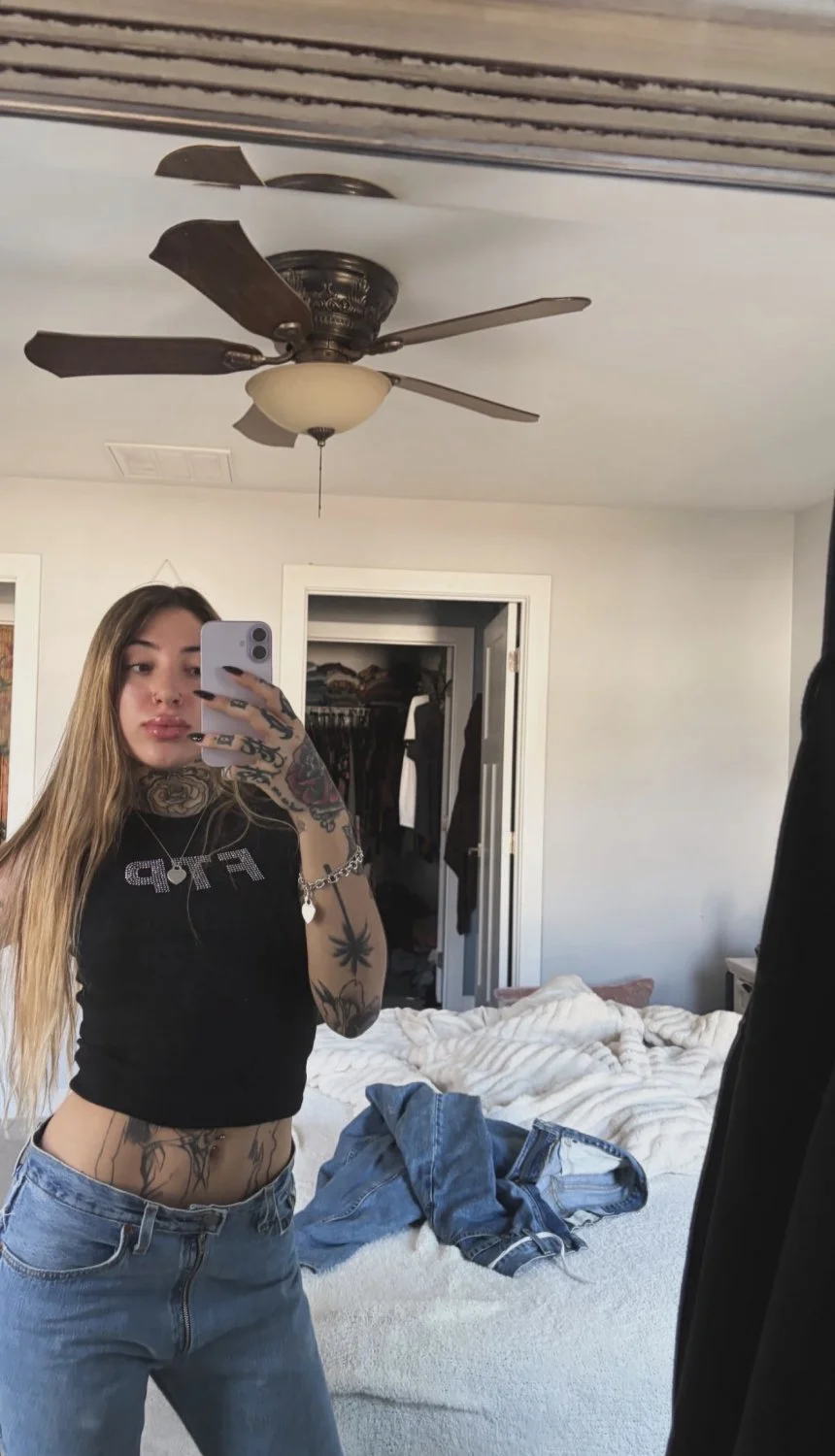 Tatted whore Alyssa showing off her ink image 3