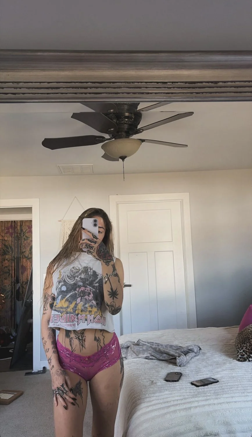 Tatted whore Alyssa showing off her ink image 6