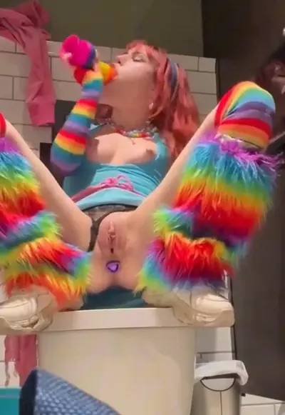 Pride dildo play in bathroom cover image