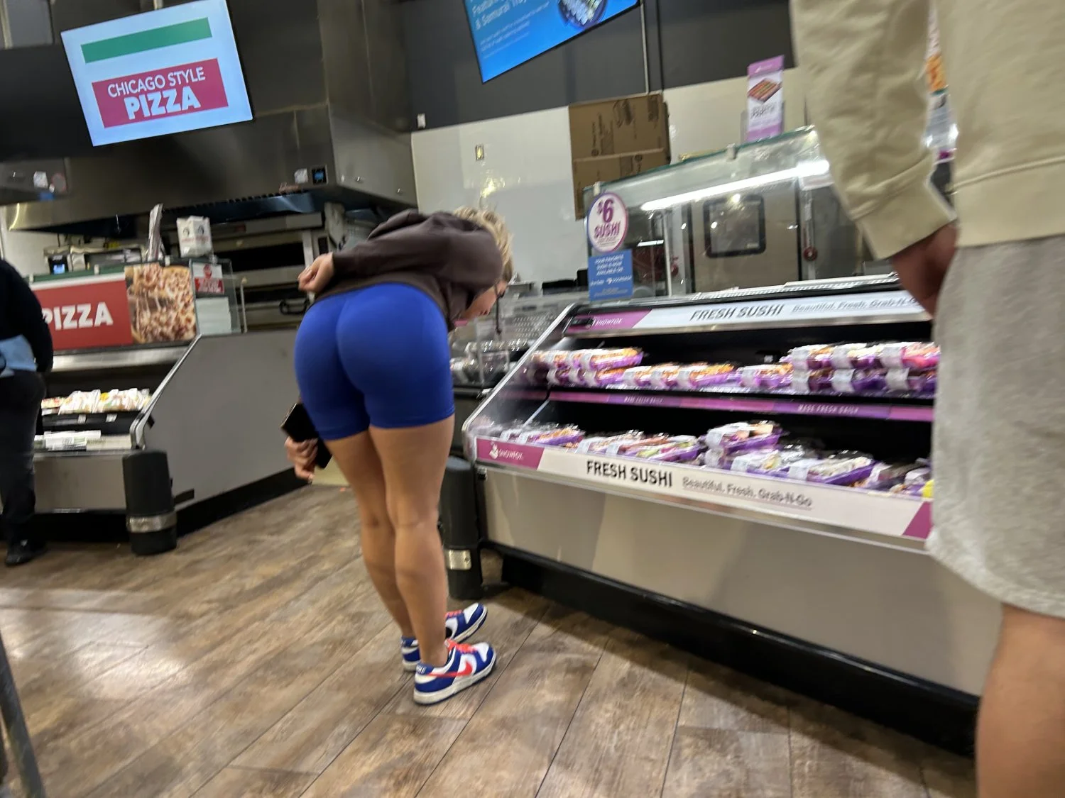 Blonde college slut shows off blue shorts image 3