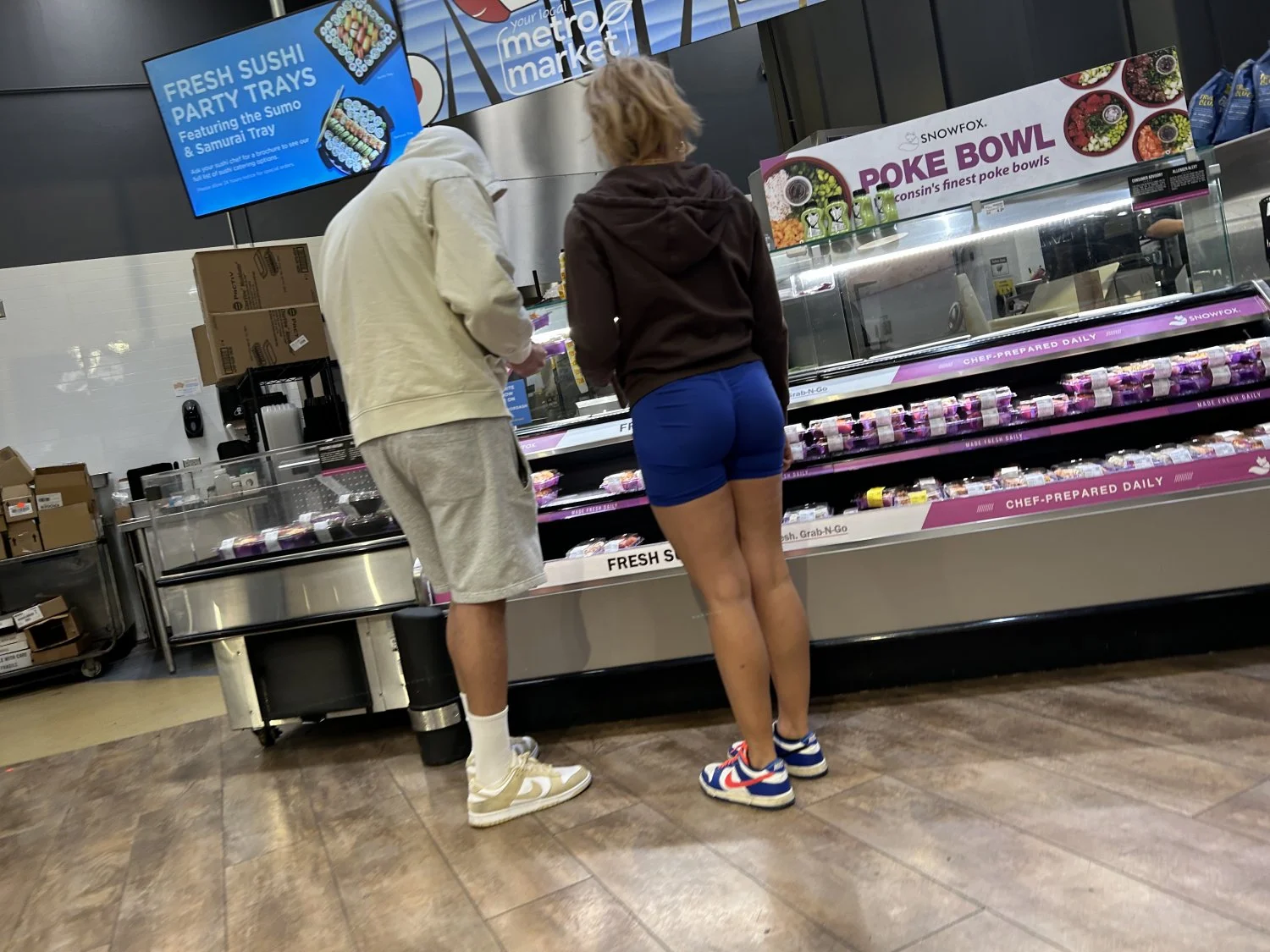 Blonde college slut shows off blue shorts image 5