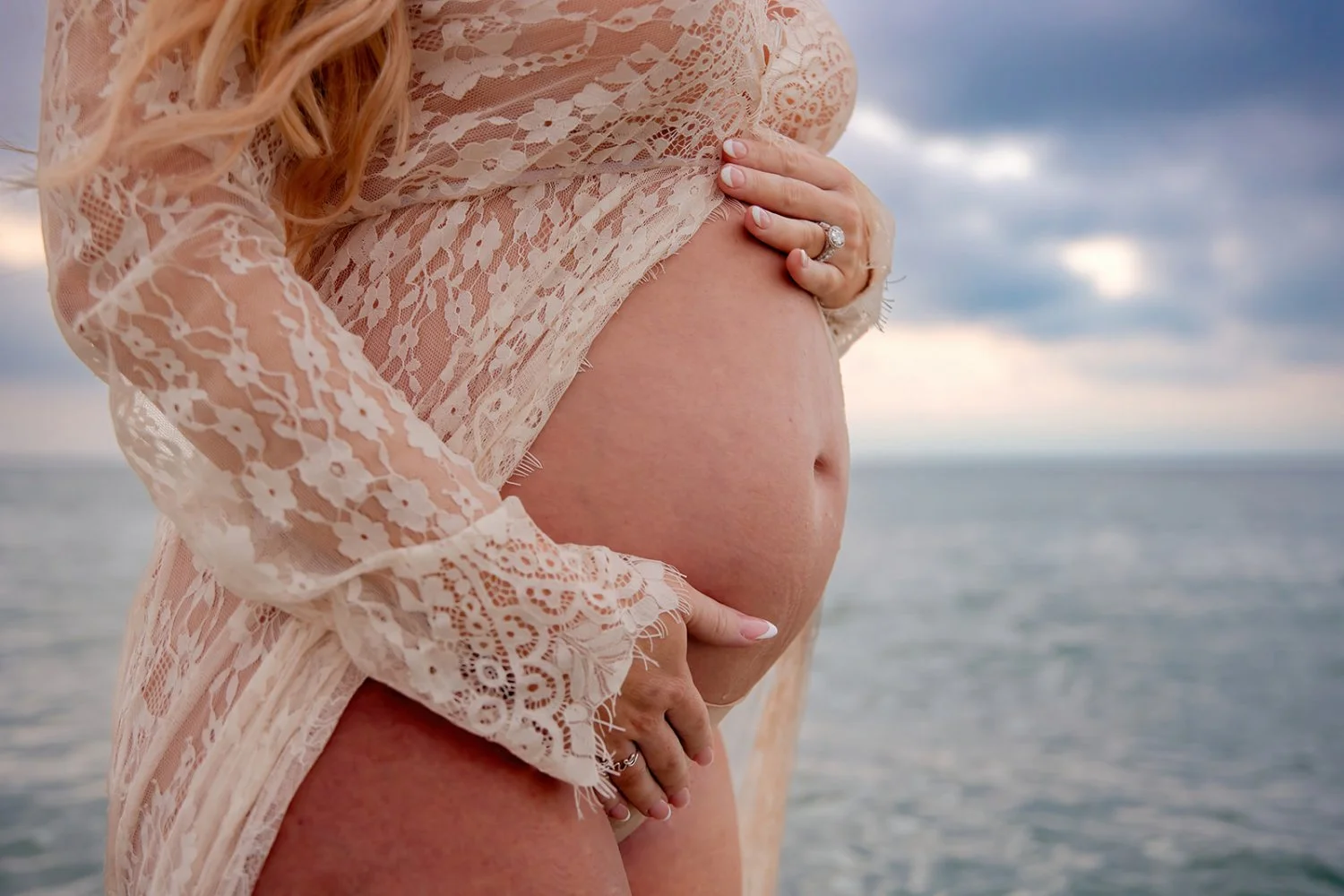 Gorgeous busty redhead pregnancy boudoir image 6
