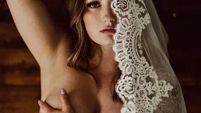 Plump brunette wife boudoir cover image