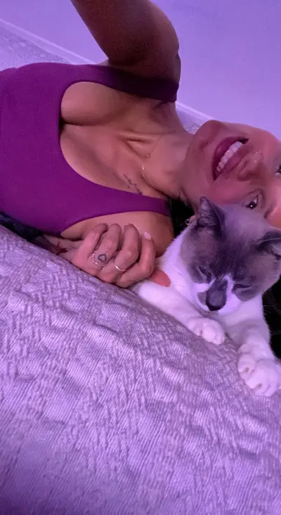 Cuddles, purrs with my cat 'cos I'm out of the office cover image