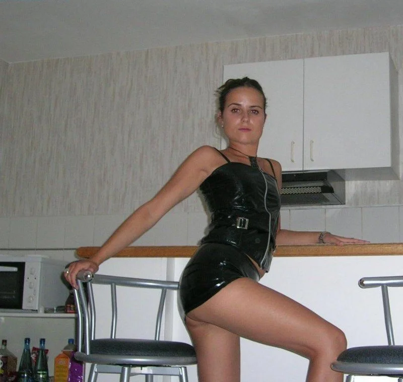 Slut sucks in latex image 10