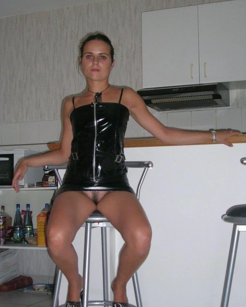 Slut sucks in latex image 16