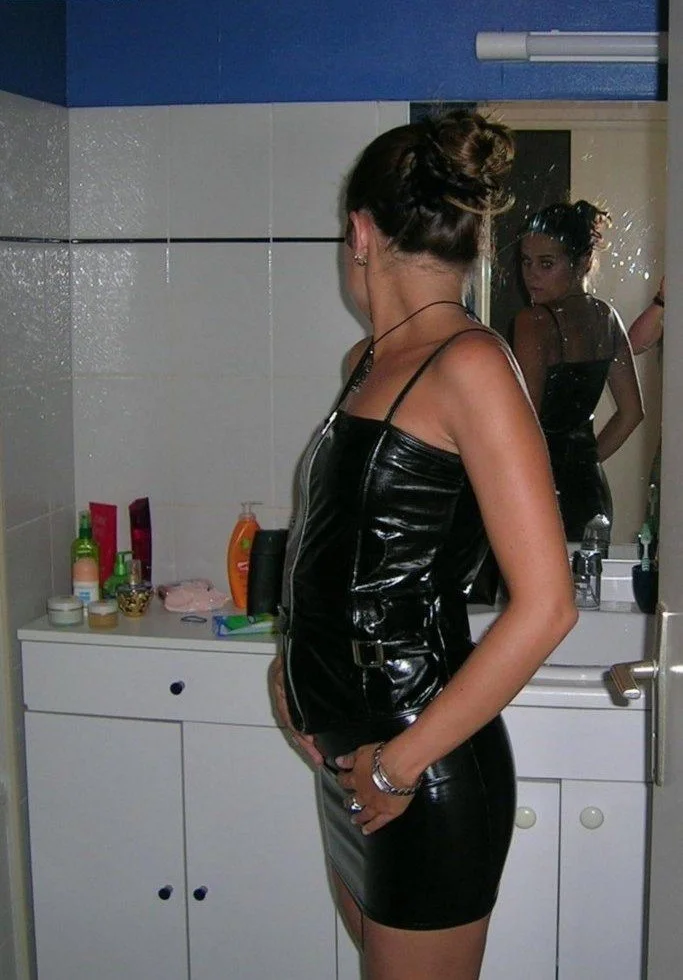 Slut sucks in latex image 8
