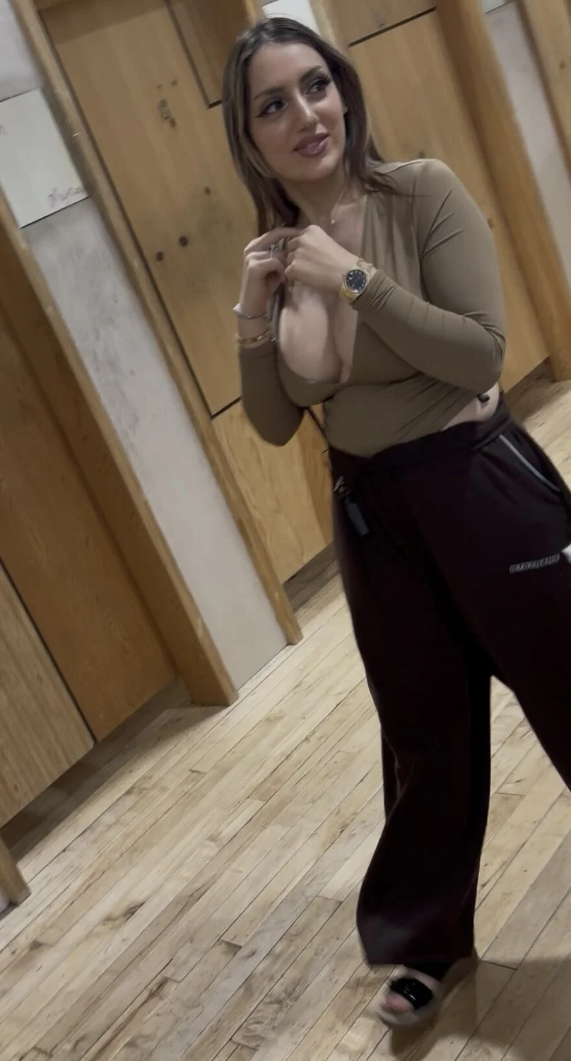 Sexy department store Latina showing off her tits image 3