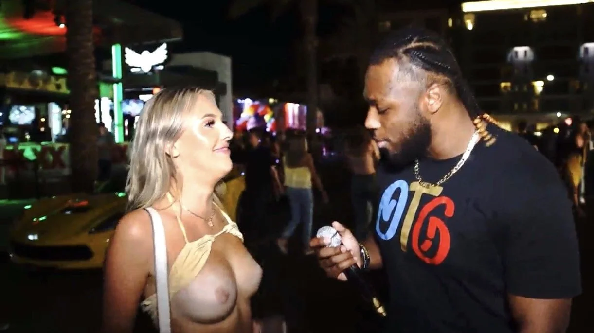 Nurse Emilie takes a break from traveling to have some guy suck her titties in a street interview image 2