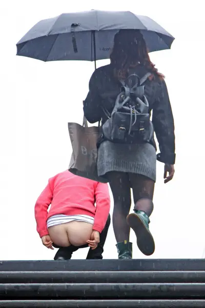flashing ass in the rain... cover image
