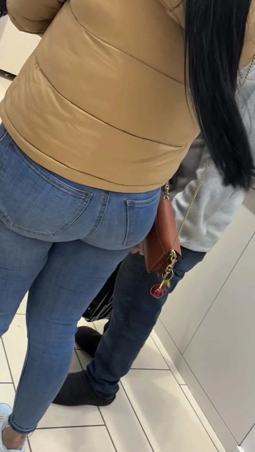 MILF booty in jeans image 12