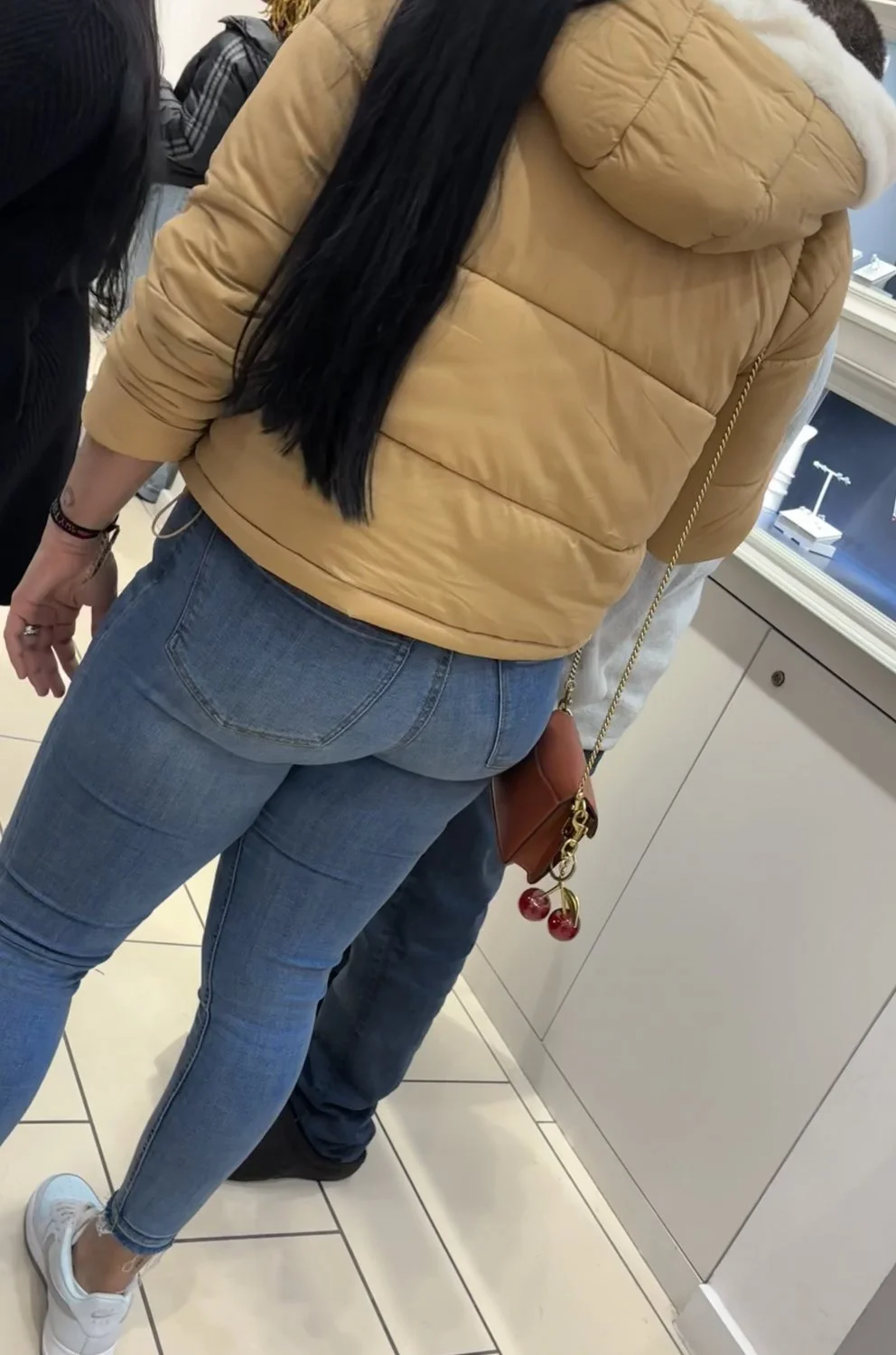 MILF booty in jeans image 16