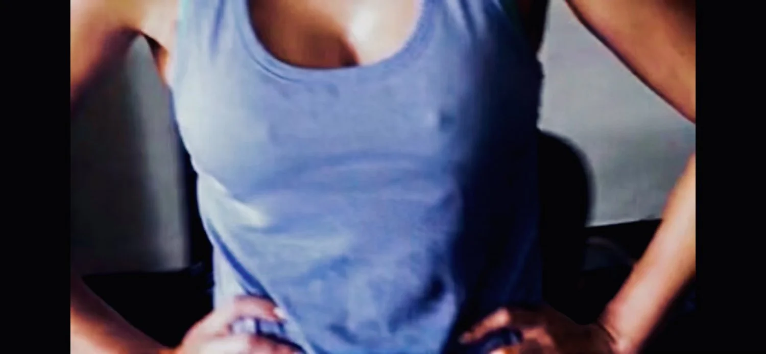 MILF with hard nipples image 4
