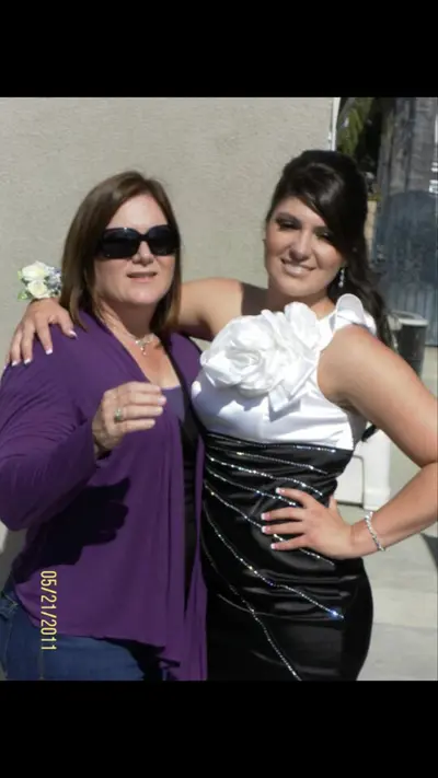 Prom season!!! Who’s throat needs use more? Mom or the slut. Comment like and share! Satin dress! cover image