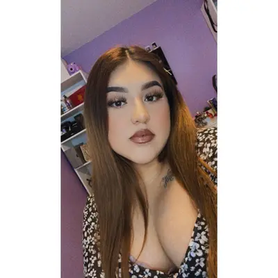 Young Latina milf showing her ass cover image