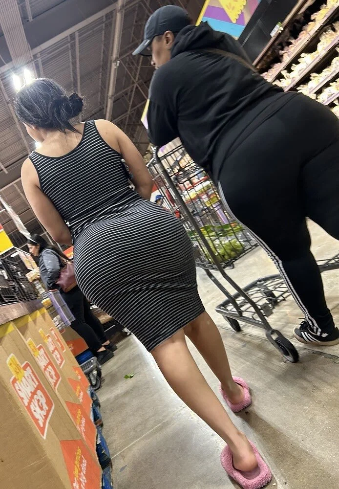 Latina mom in dress looking image 3