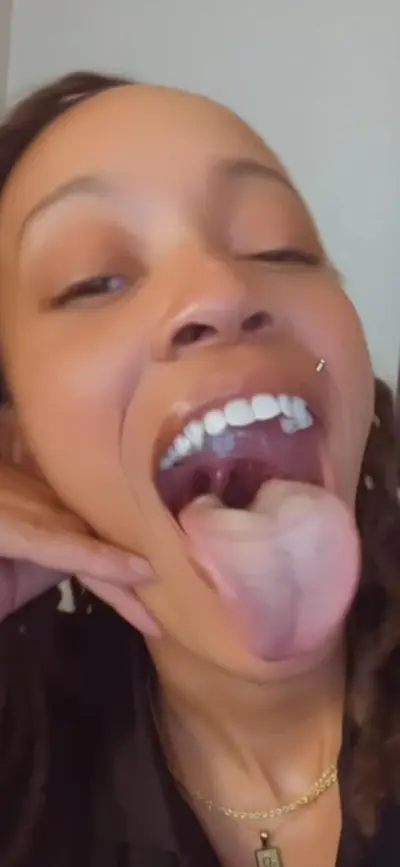 Dyke is back playing with her big mouth and long tongue begging you to cum all over her cover image