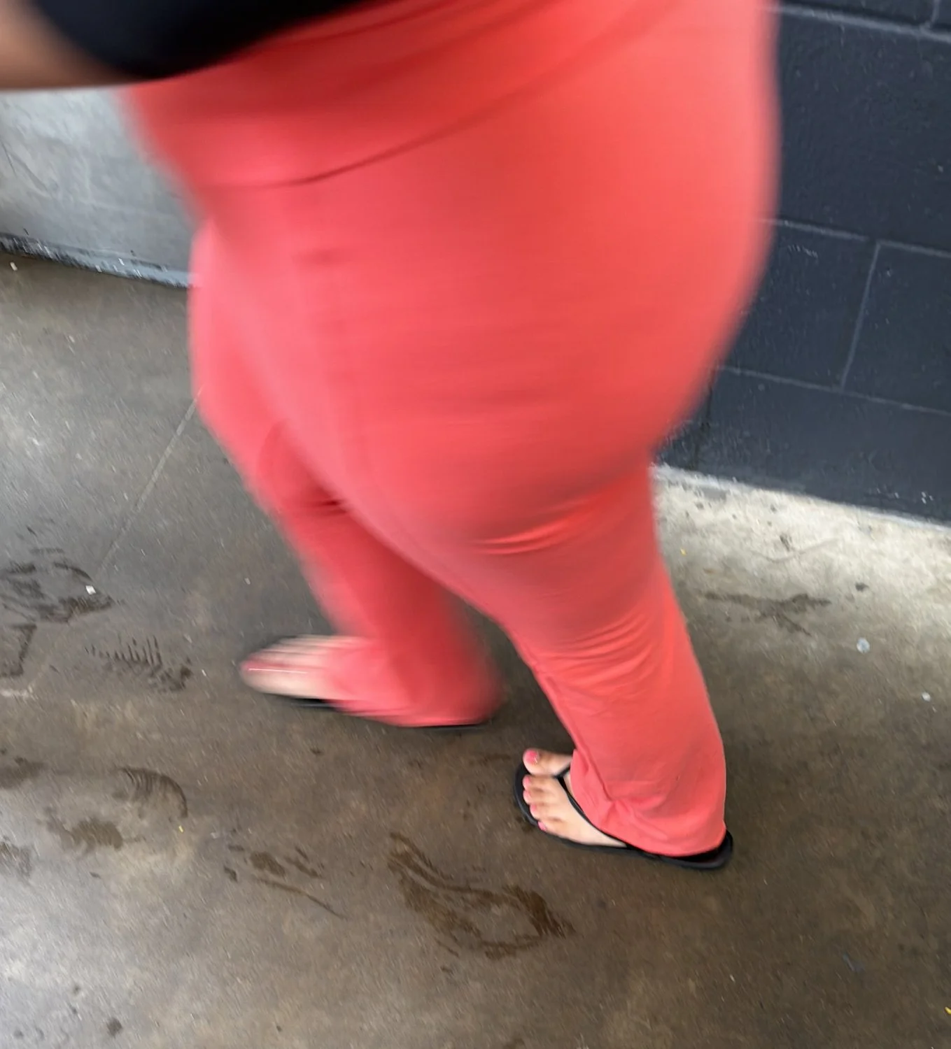 Woman’s feet in pink leggings image 1