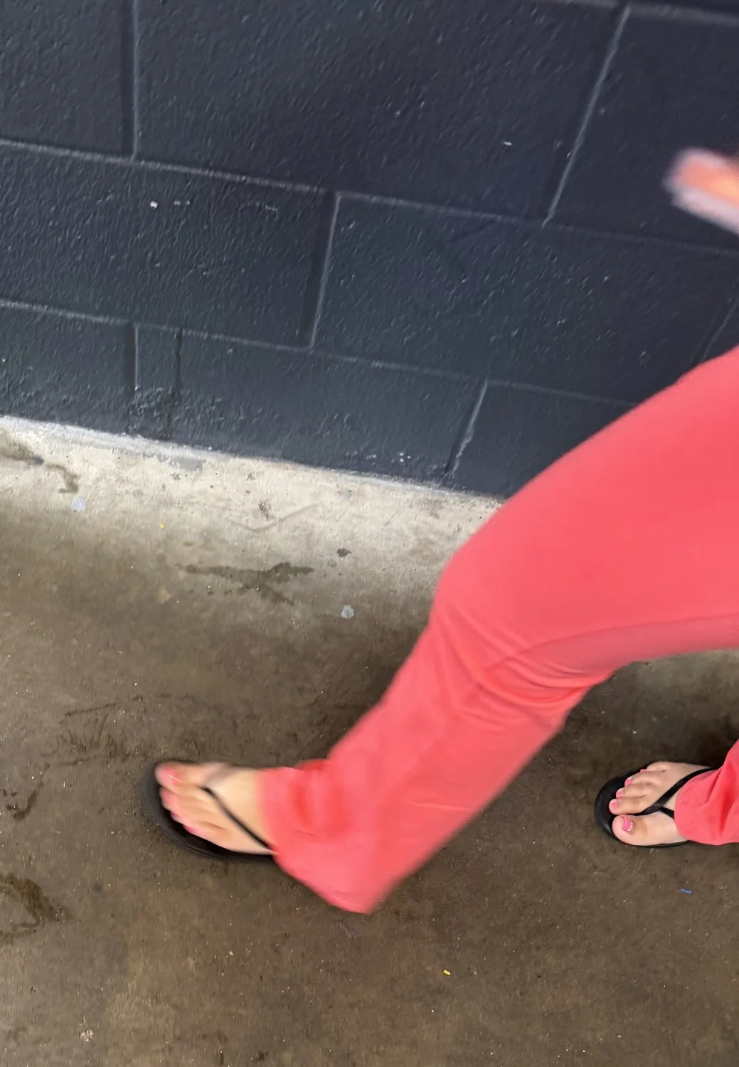 Woman’s feet in pink leggings image 6