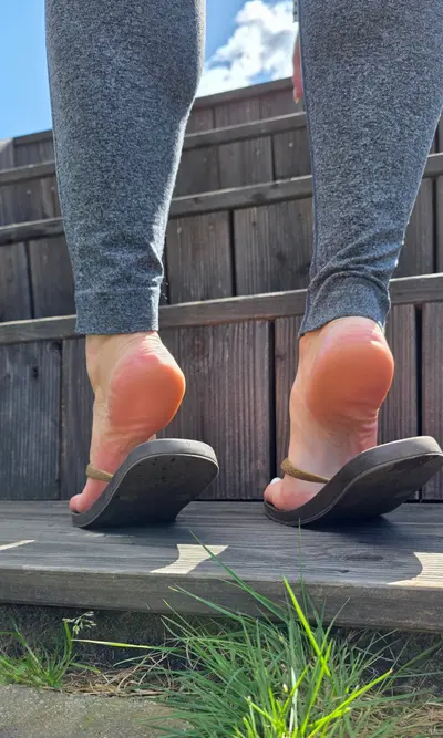 Feet photoshoot with blonde housewife in her backyard cover image
