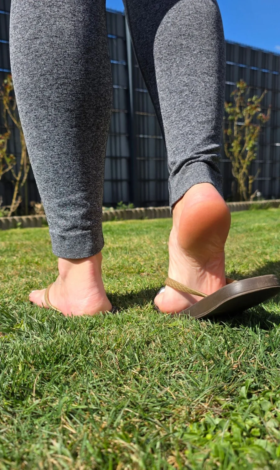 Feet photoshoot with blonde housewife in her backyard image 8