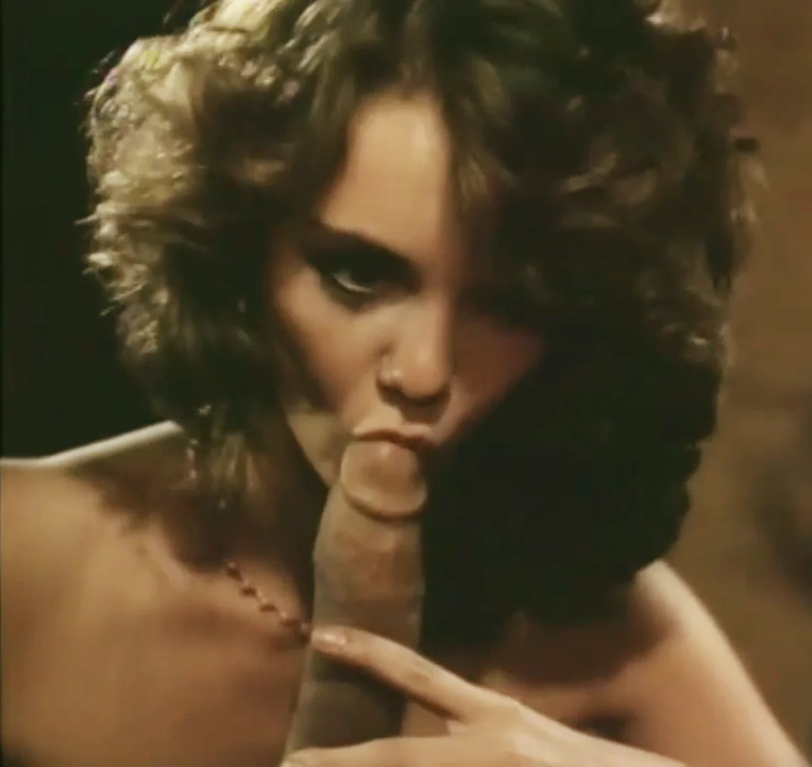 Retro brunette makes Ron Jeremy cum hard main image