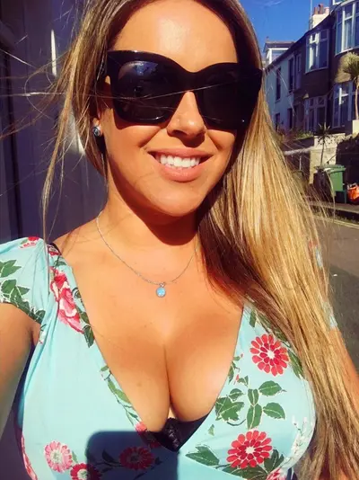 Who's this busty blonde hottie?? cover image