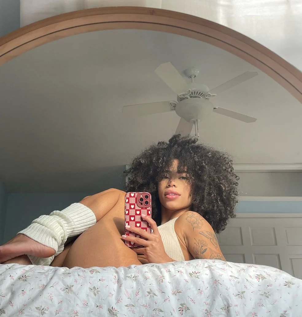 Curly lightskin teen with hot body main image