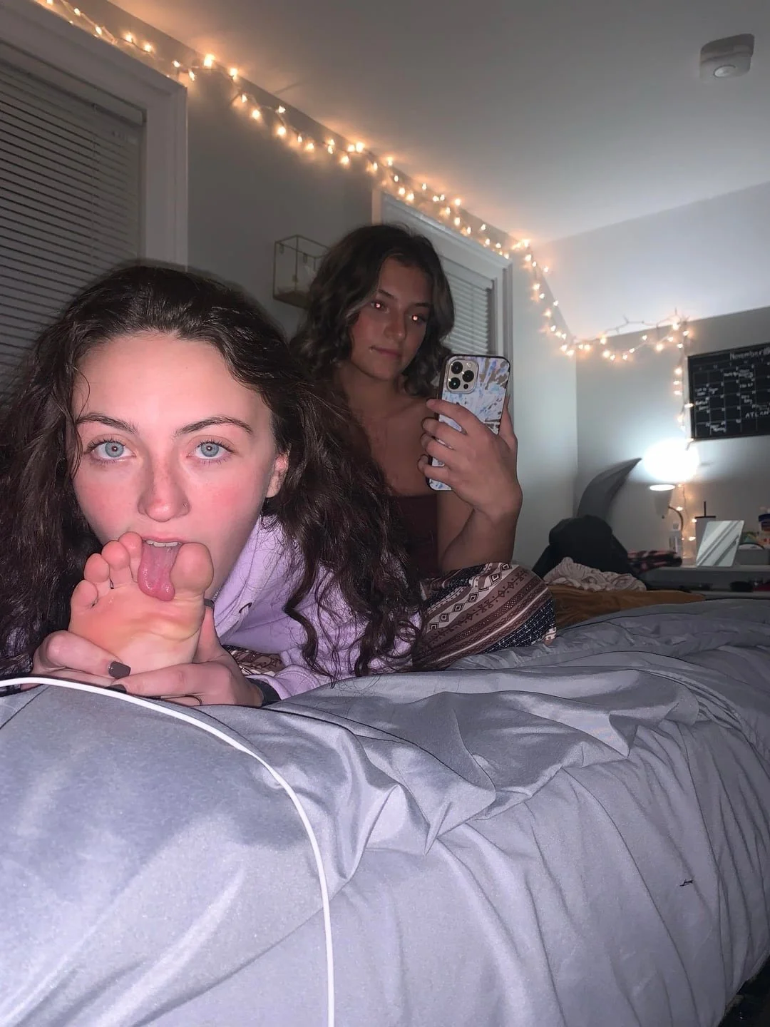 College roommates making feet content together! image 1