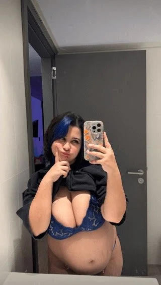 Busty blue hair slut loves to show off image 8