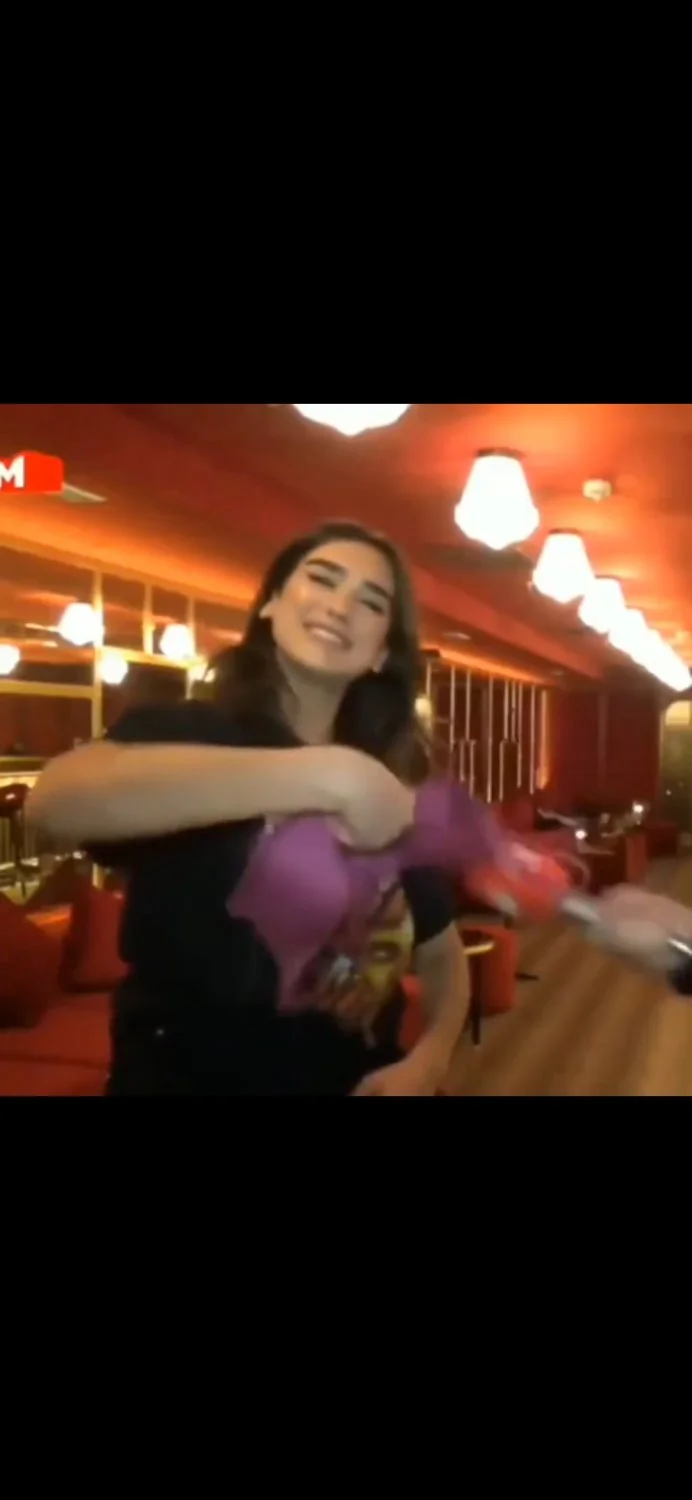 Dua Lipa takes off her bra main image