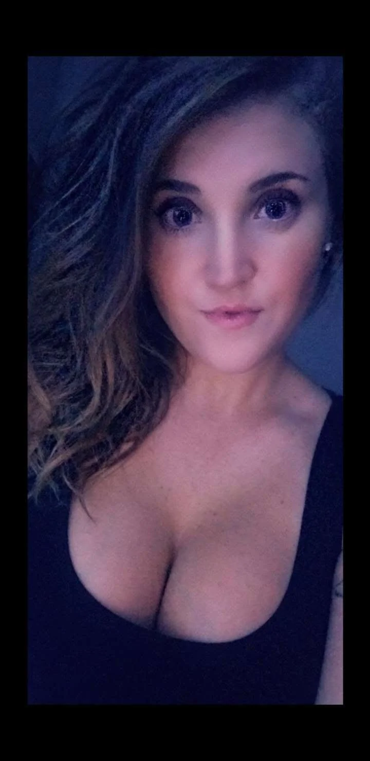 She Loves Showing Off Her Tits image 2