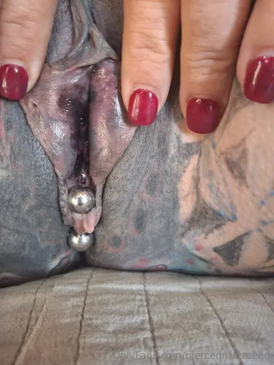 White Bitch with pussy tattoos and tattoos on her tits cover image