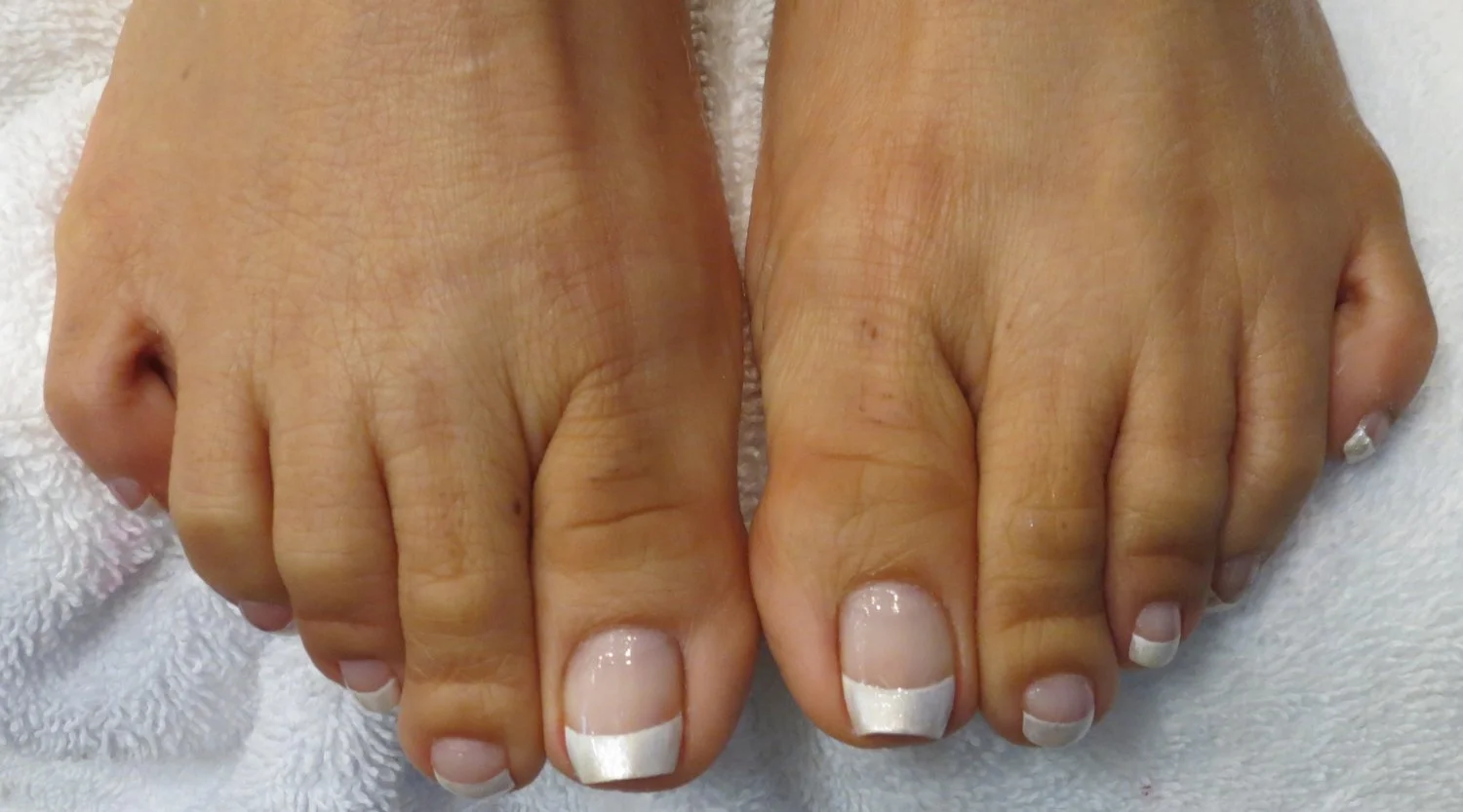 Asian nail salon owner's feet image 13