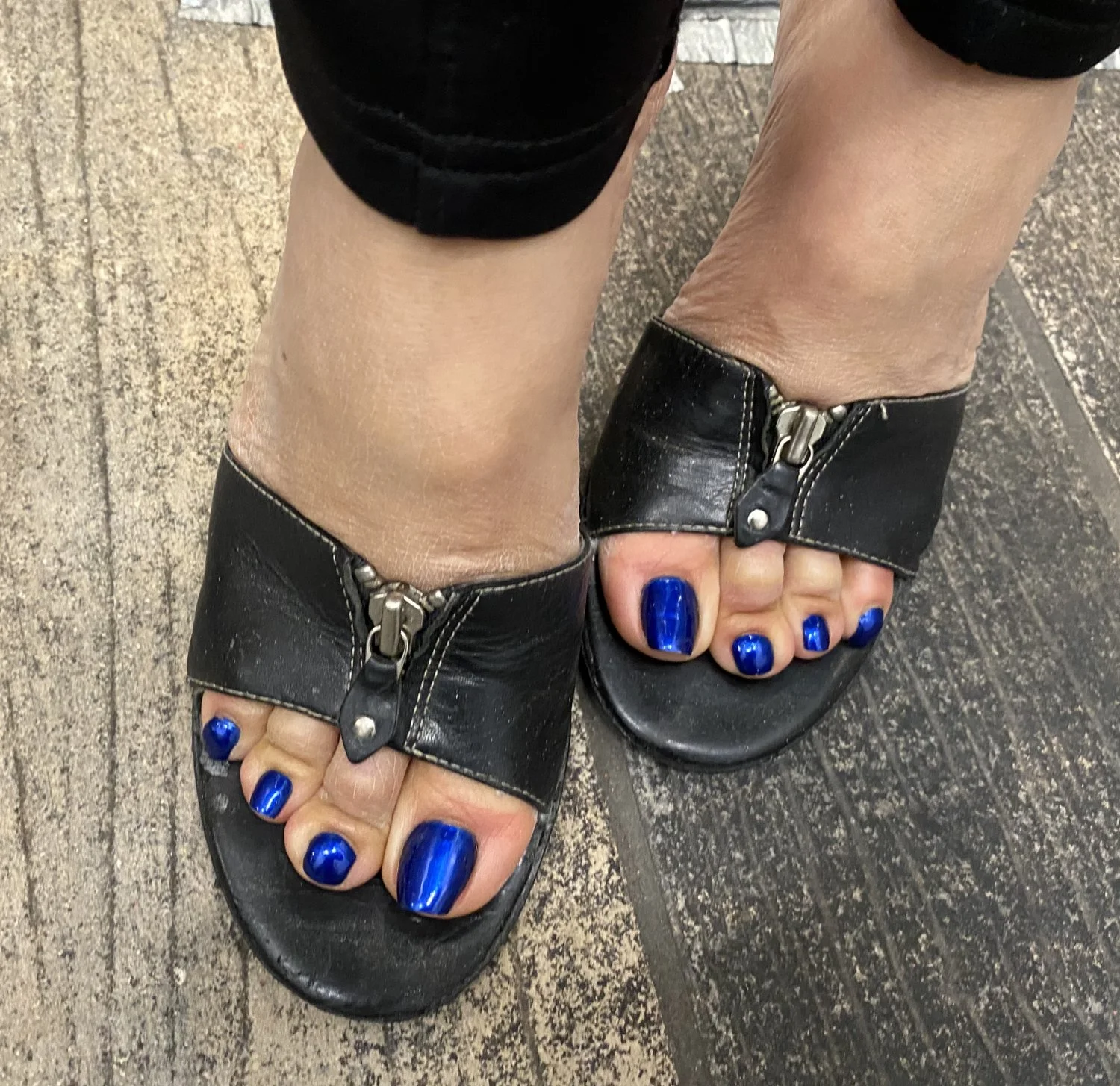 Asian nail salon owner's feet image 16