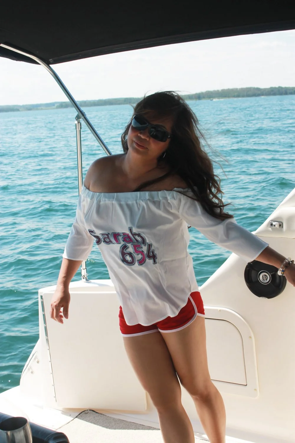 Boating on a busy lake. Guy helps himself to my wife and fucks her in plain view main image