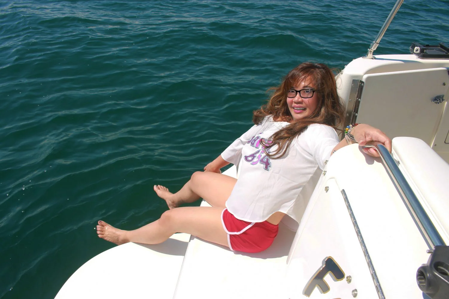 Boating on a busy lake. Guy helps himself to my wife and fucks her in plain view image 5